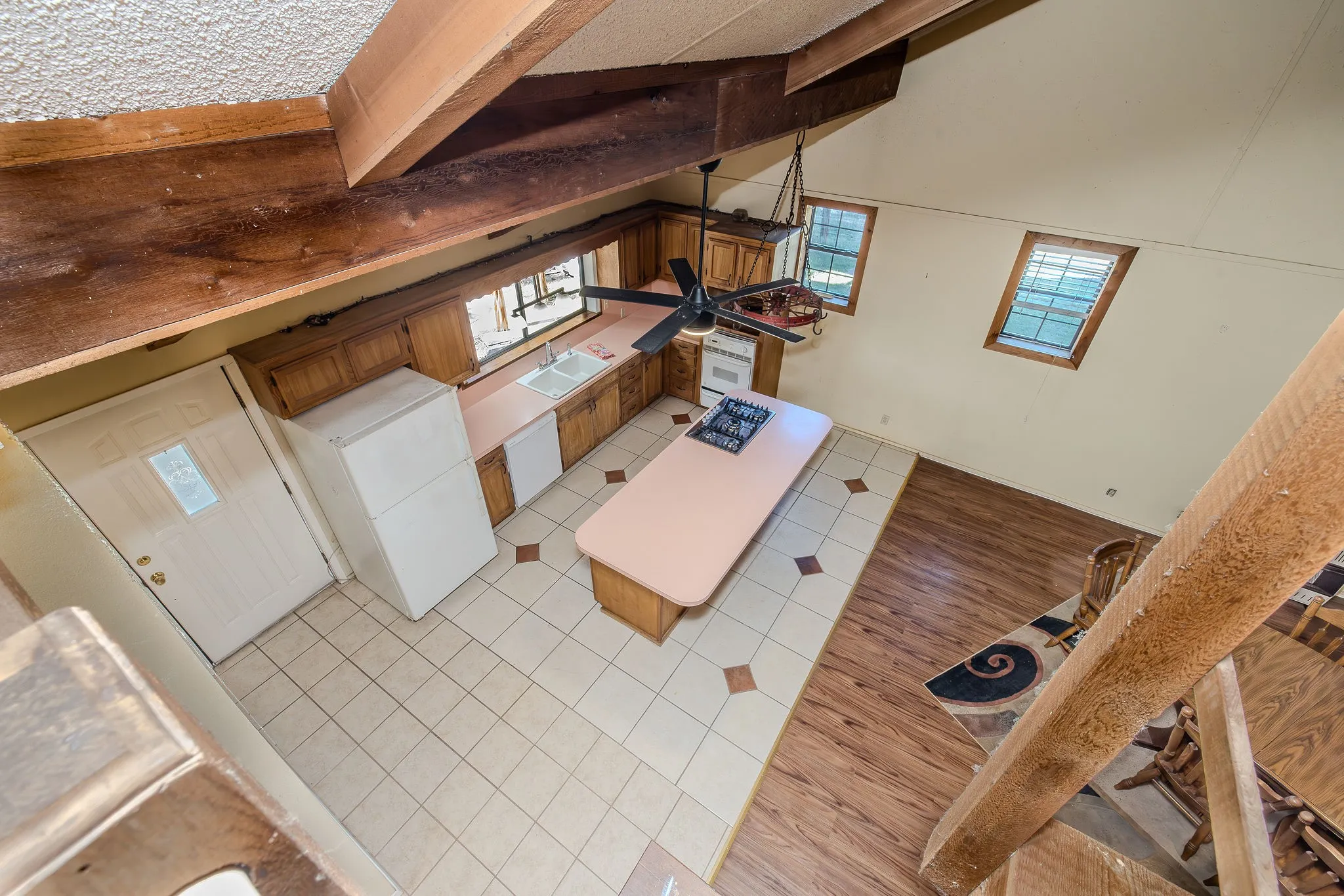 Kitchen viewed from loft area.