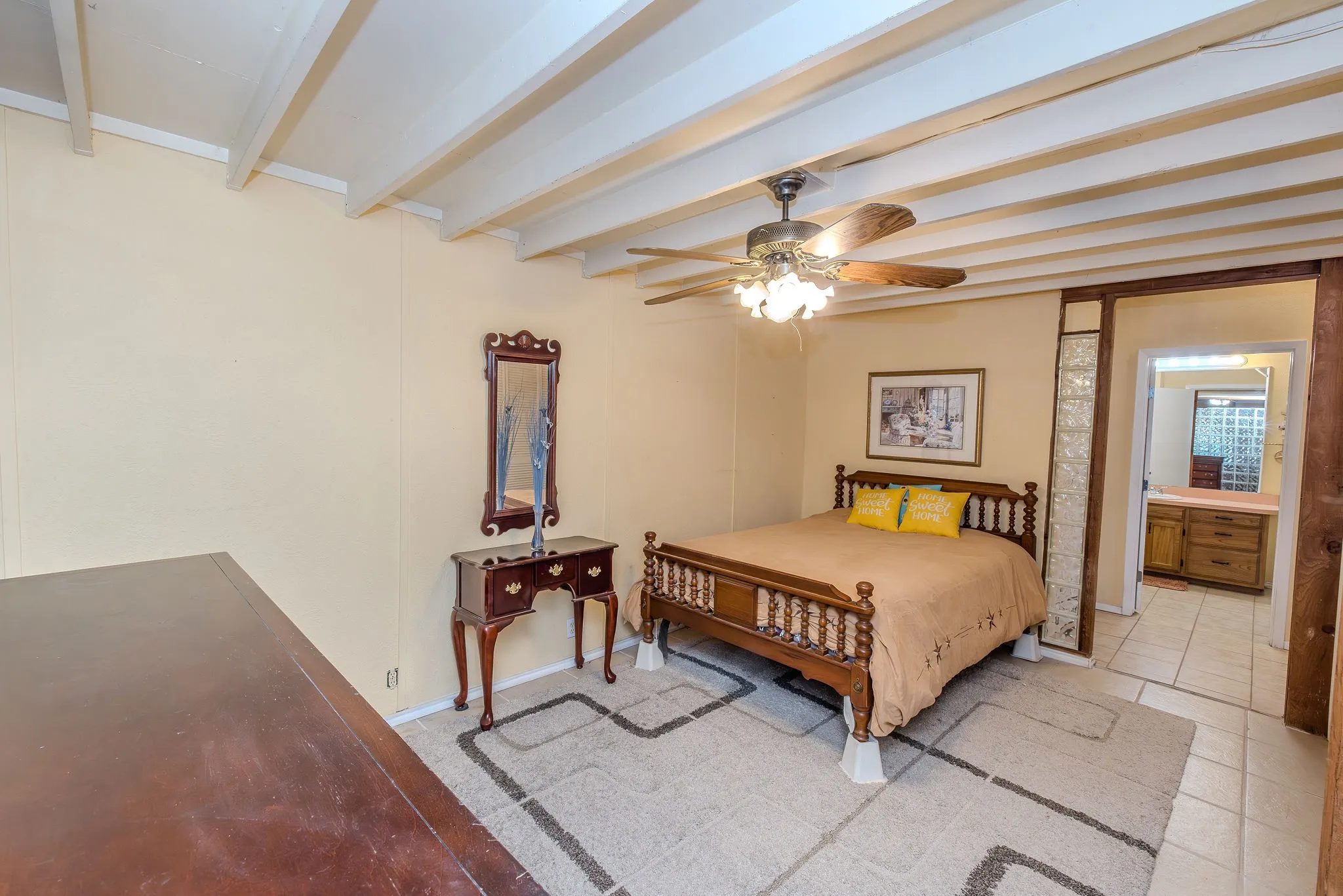 The primary bedroom is situated across the hall from the bathroom.