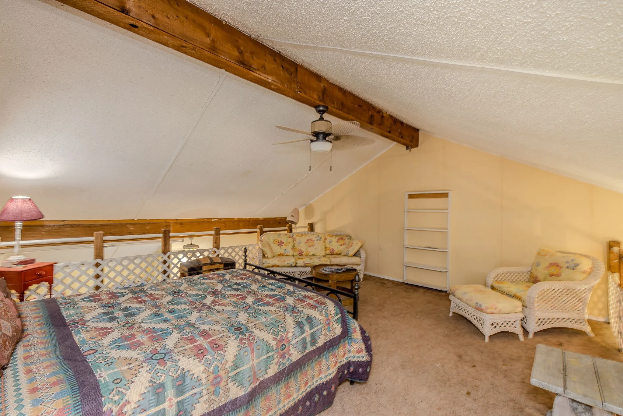 Loft is currently empty; photo shows it when used as an extra guest space.