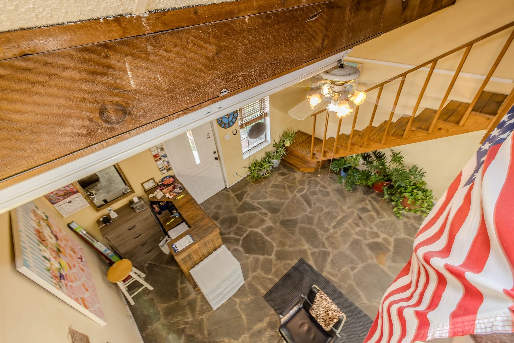 View from loft into main salon area.