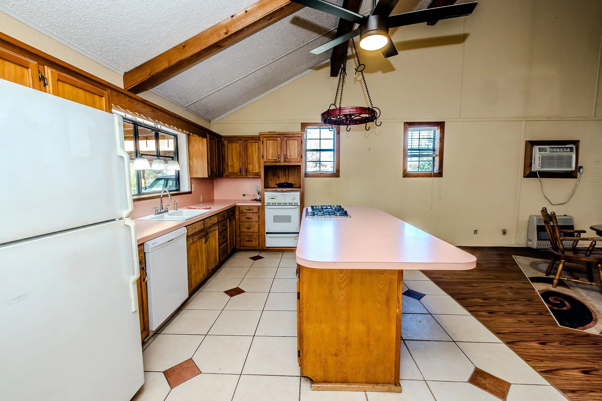 Kitchen island provides ample work space and storage.