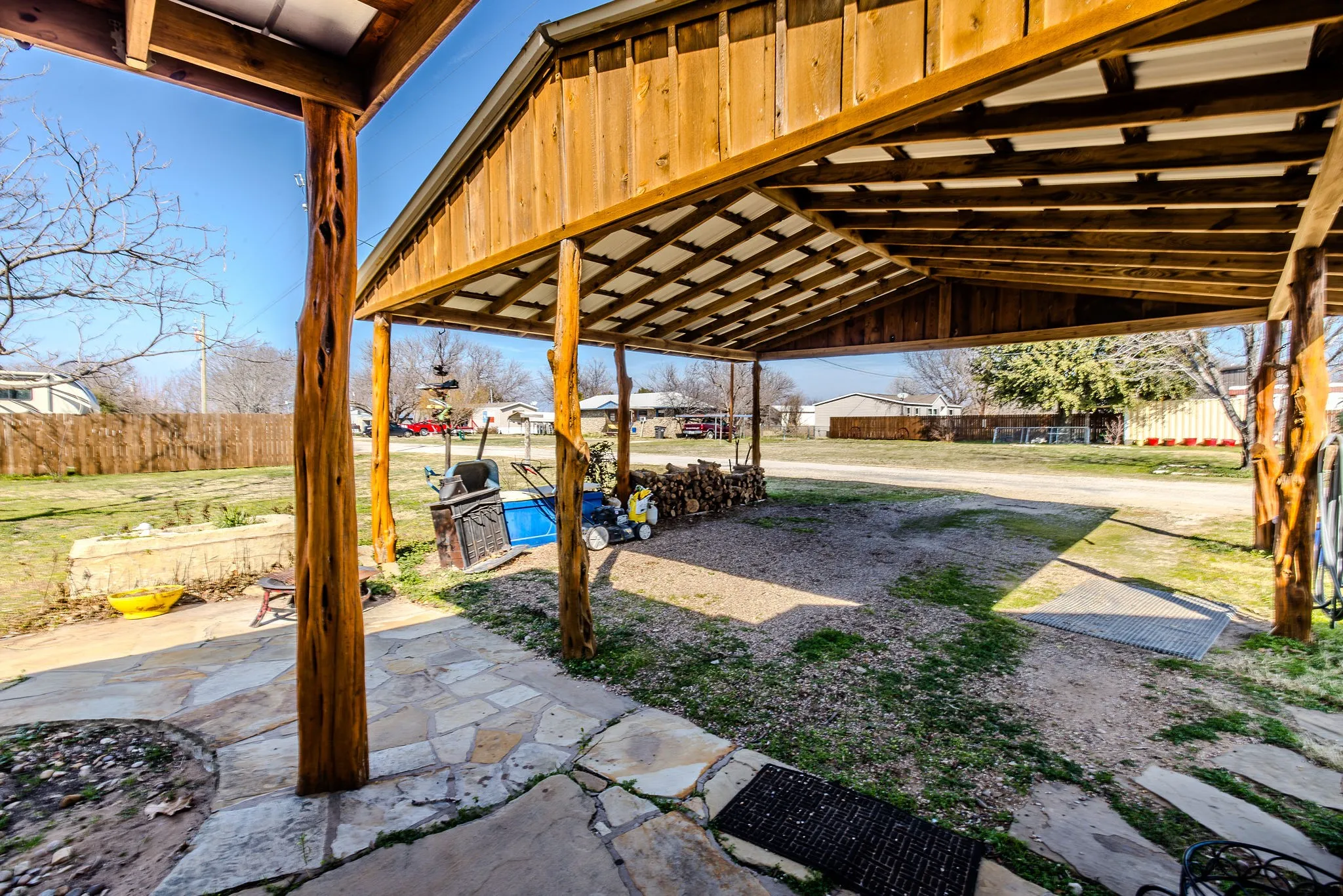 This two car covered carport is situated towards the back entry to the house, with easy access for carrying groceries into the kitchen.