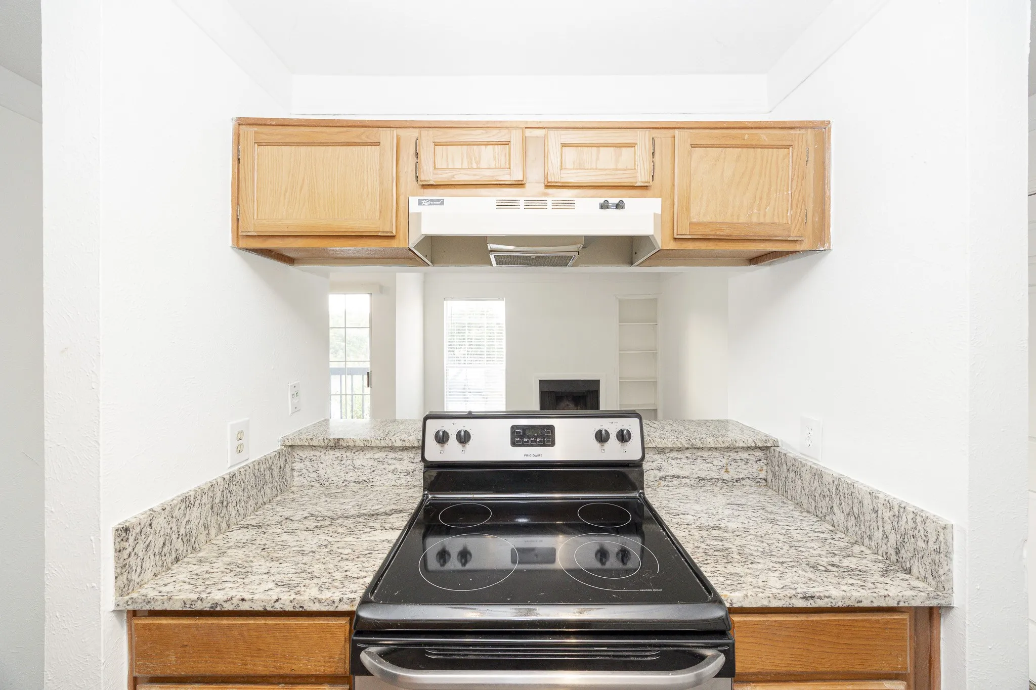 Granite-style countertops with a matching backsplash