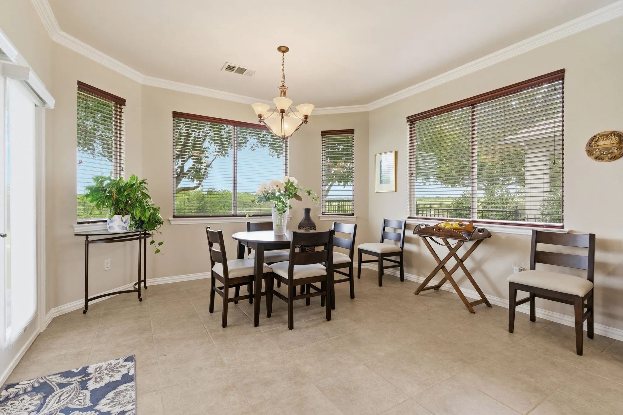 Open dining area with beautiful bay windows