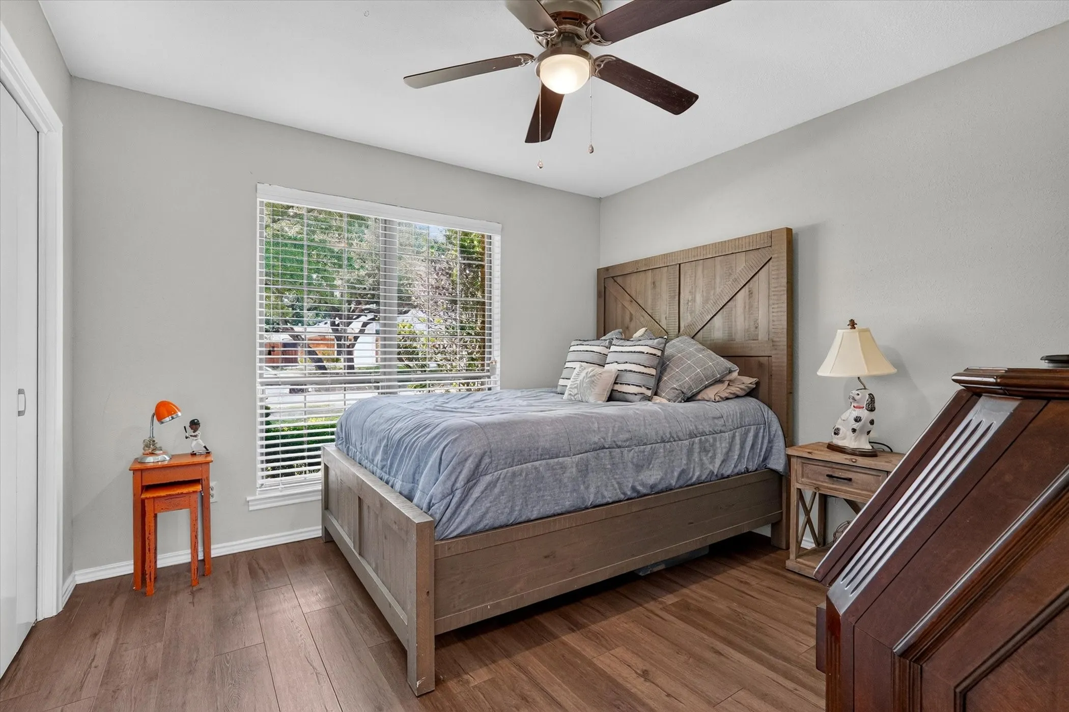 Bedroom #3 with ceiling fan and wood-like flooring