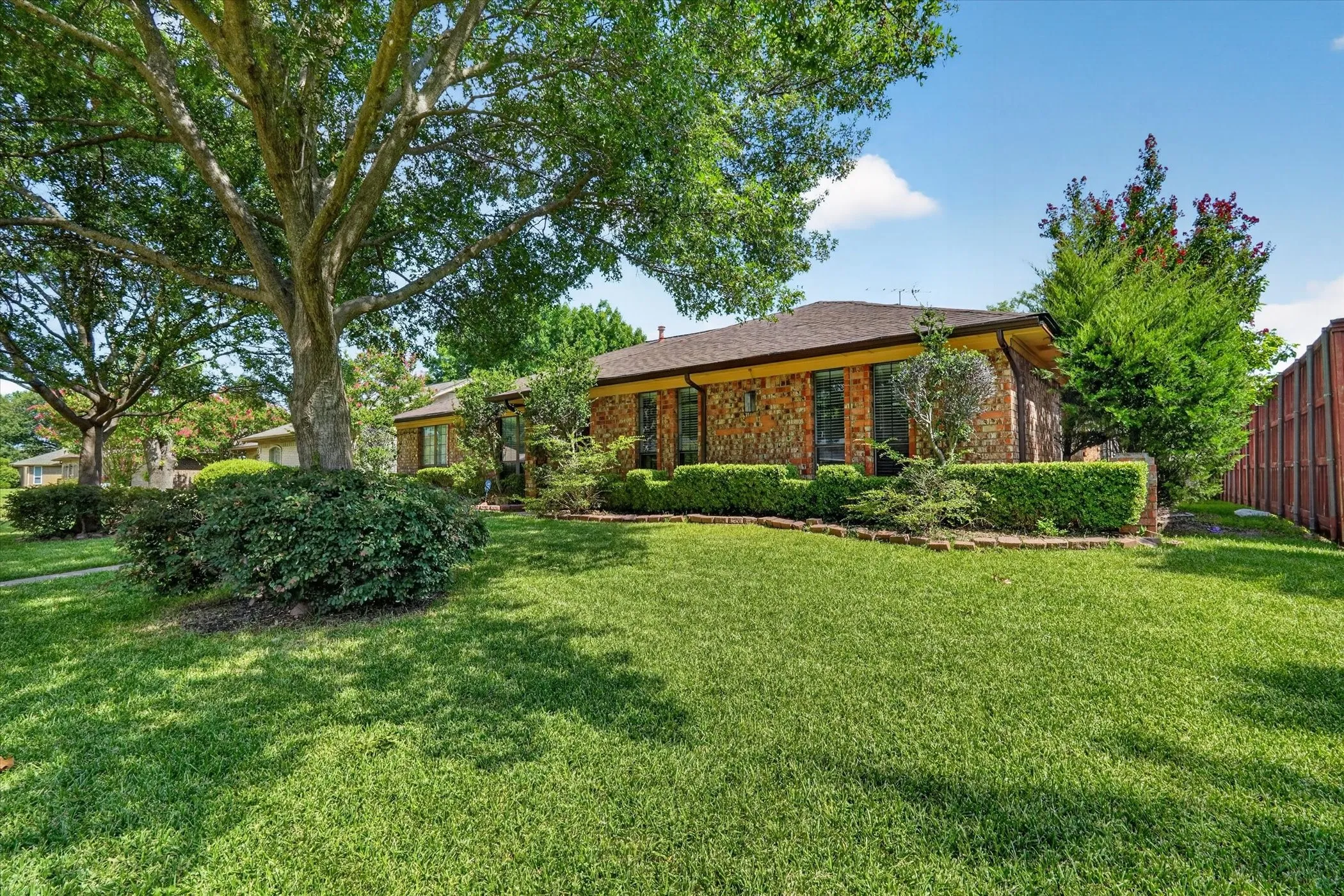 Large front yard with lush St. Augustine
