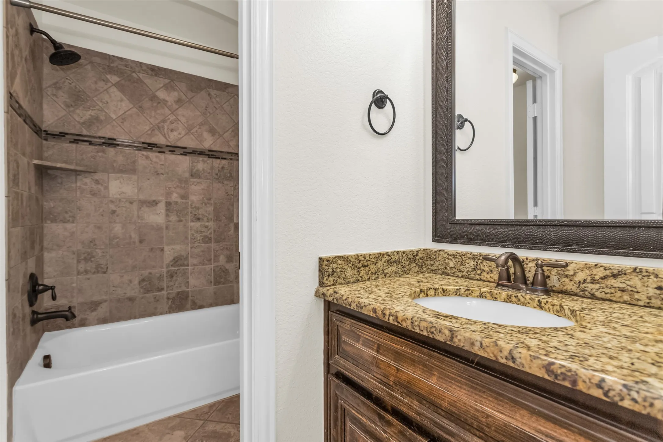 Jack and jill bathroom connecting the other 2 bedoroms and hallways
