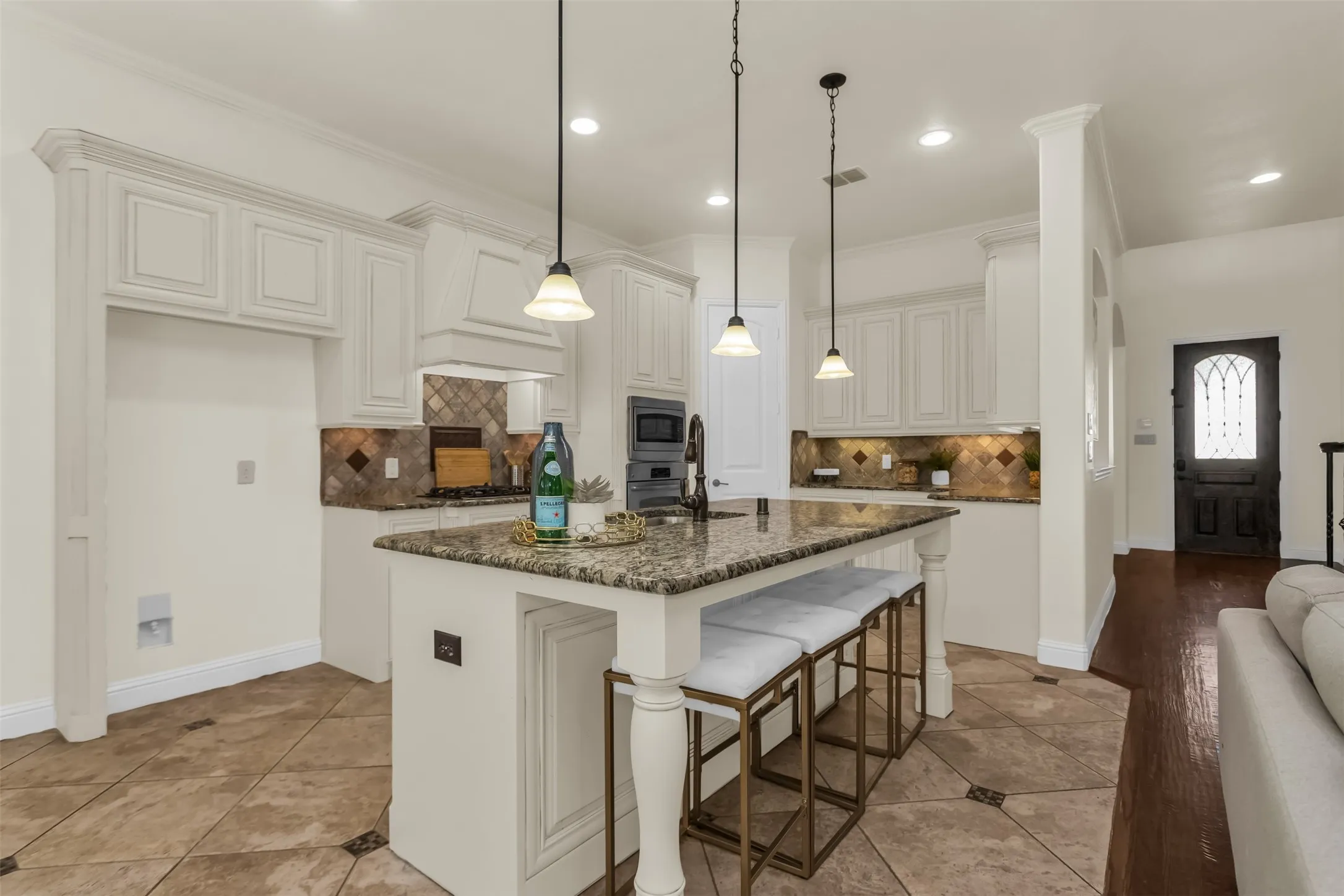 Custom carved wood cabinetry