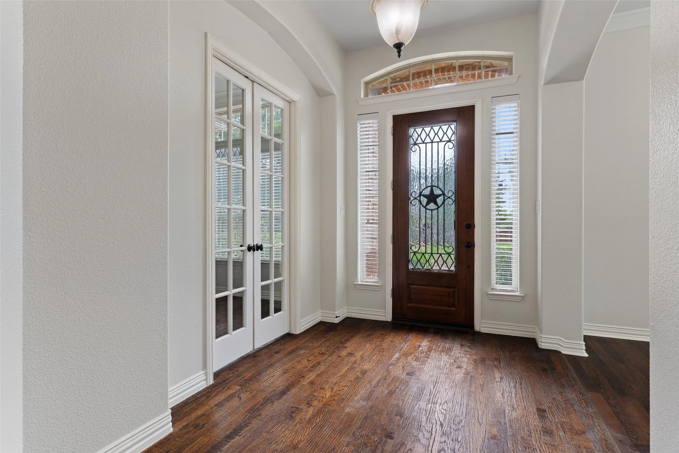 Office with french doors with dining room adjacent