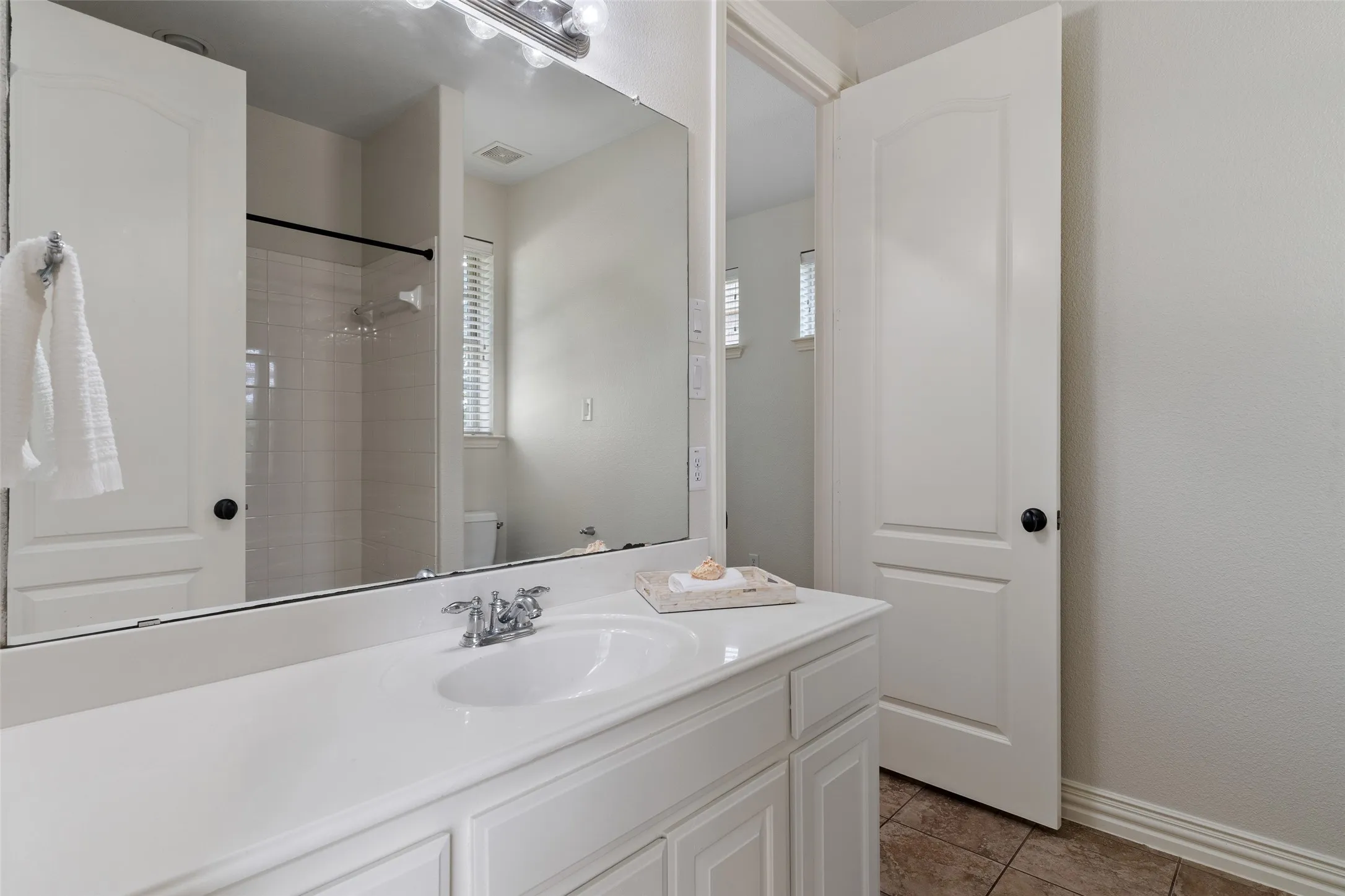 Bath between bedroom #2 and #3