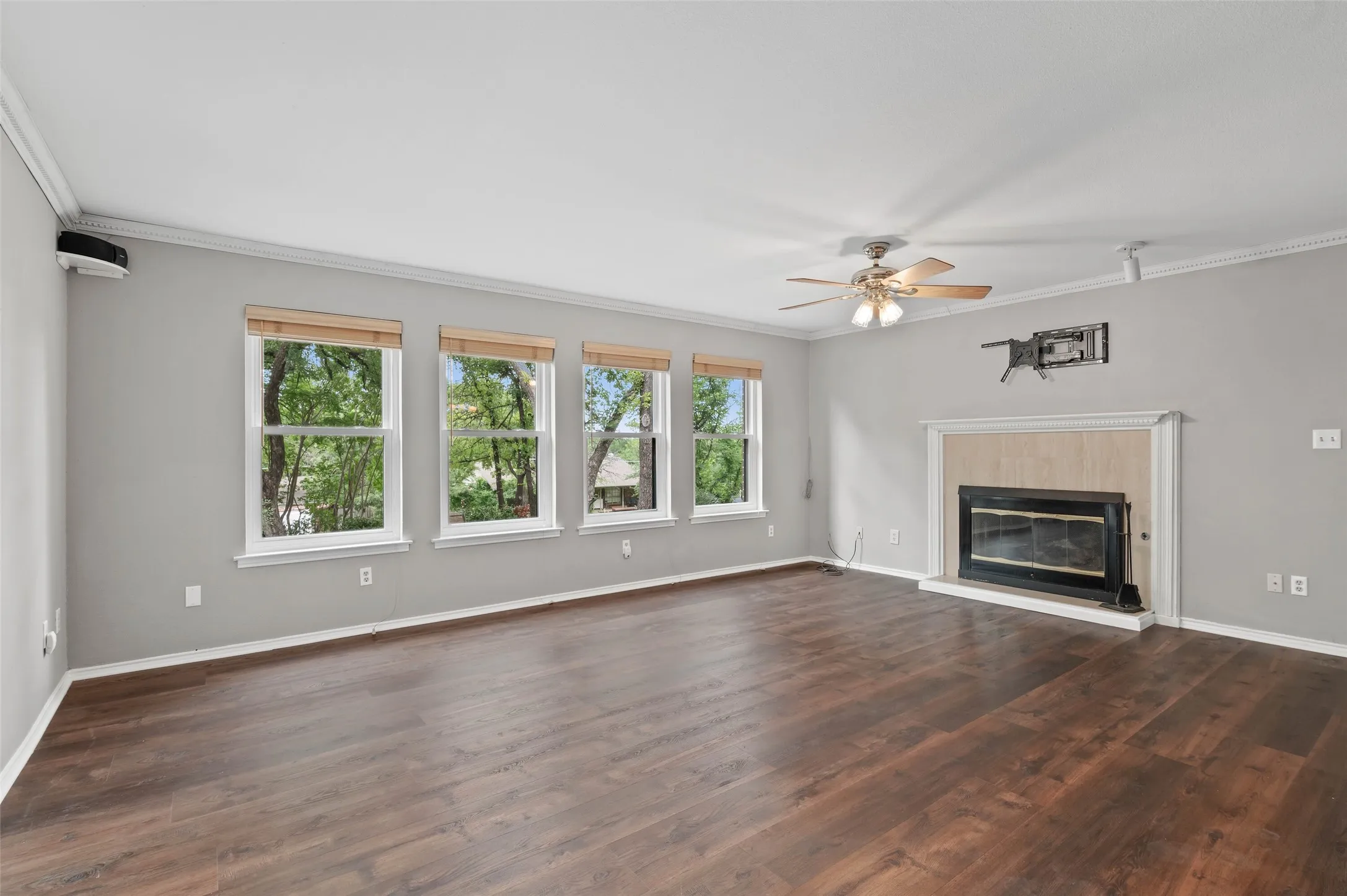 Living room with fireplace and new Pella windows