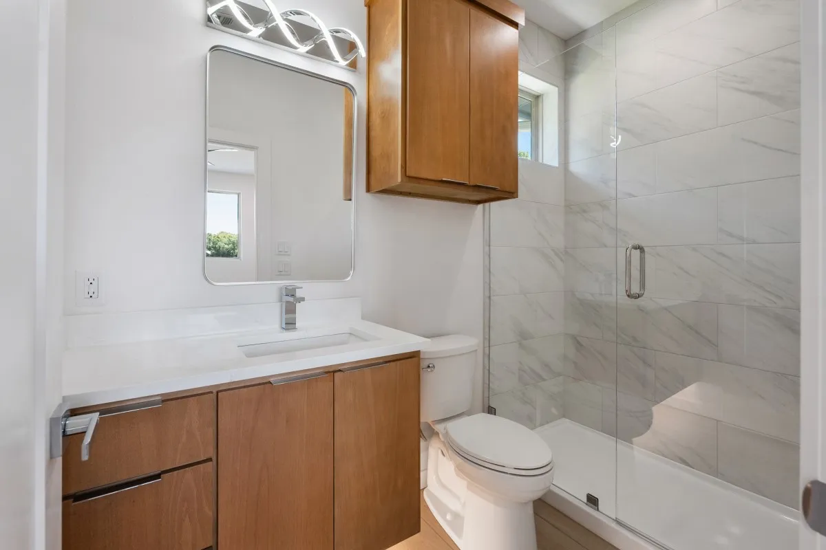 2nd floor full bath attached to 3rd bedroom.