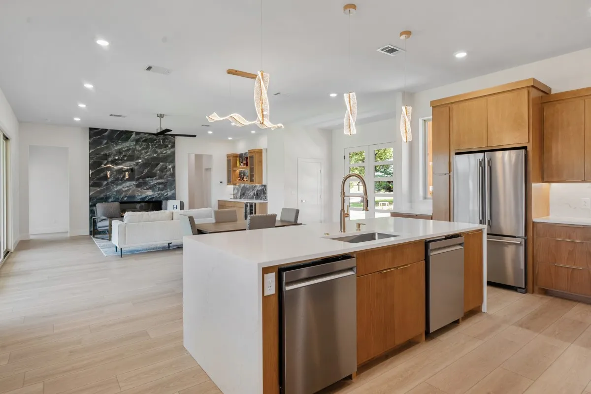 Open-concept living, dining & kitchen with panoramic water​​‌​​​​‌​​‌‌​‌‌​​​‌‌​‌​‌​‌​​​‌​​ views.