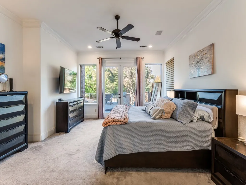 Primary bedroom has direct access to backyard and gets to enjoy the gorgeous views.