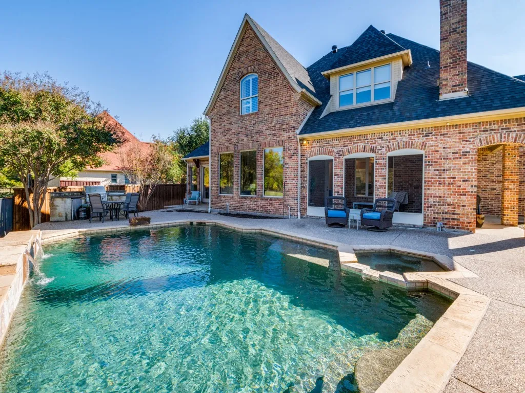 The outdoor area has lots of space for outdoor living and dining and enjoying this space.