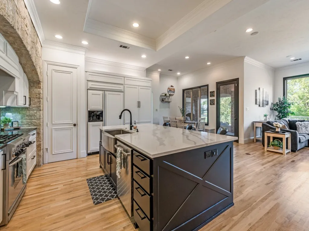 More great storage in this kitchen with a large walk-in pantry plus cabinet pantry with pull out shelves plus built-in refrigerator.