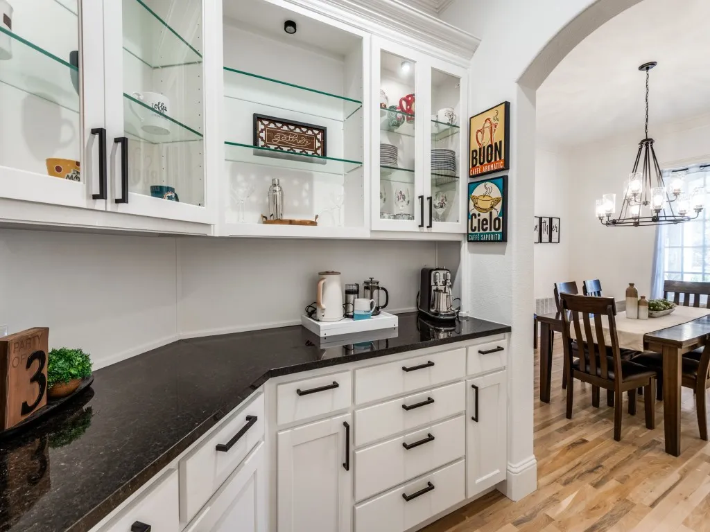 Butler's Pantry great for entertaining guests with great storage and display area.