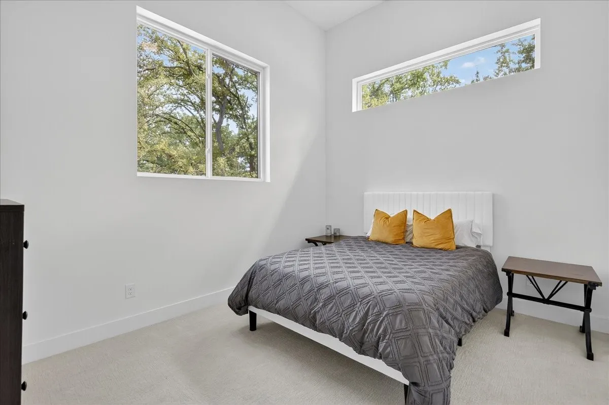 Spacious guest room filled with natural light