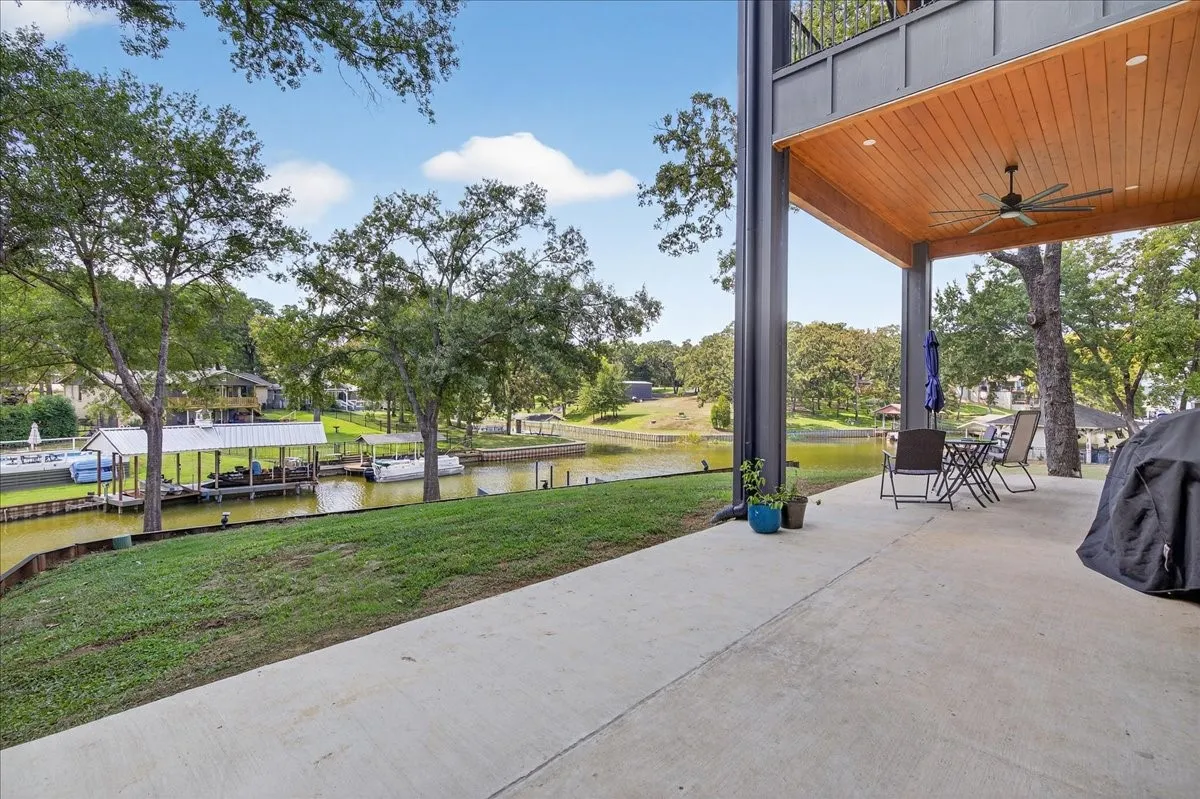 Outdoor living space designed for relaxing and entertaining by the water