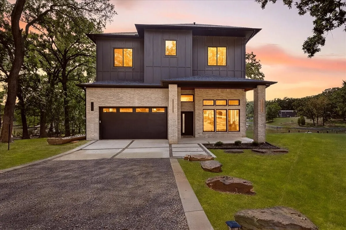Evening view showcasing the home's contemporary design