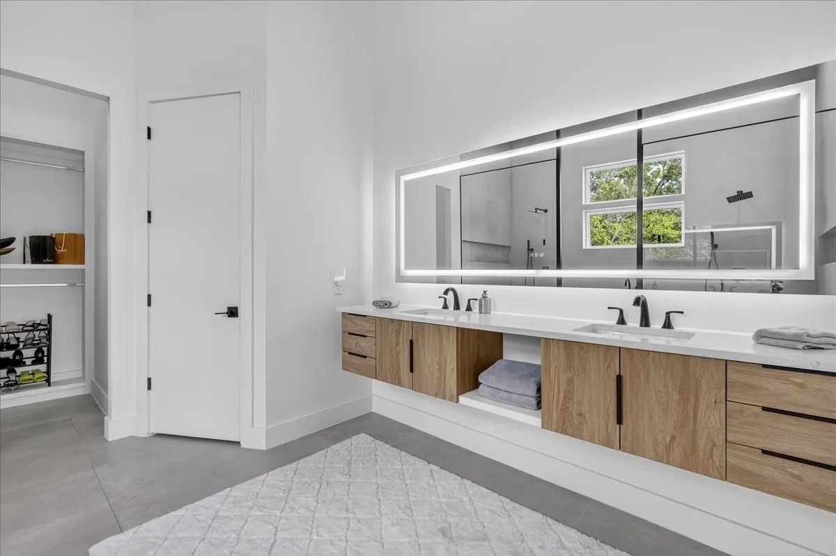 Primary bath designed with premium finishes throughout