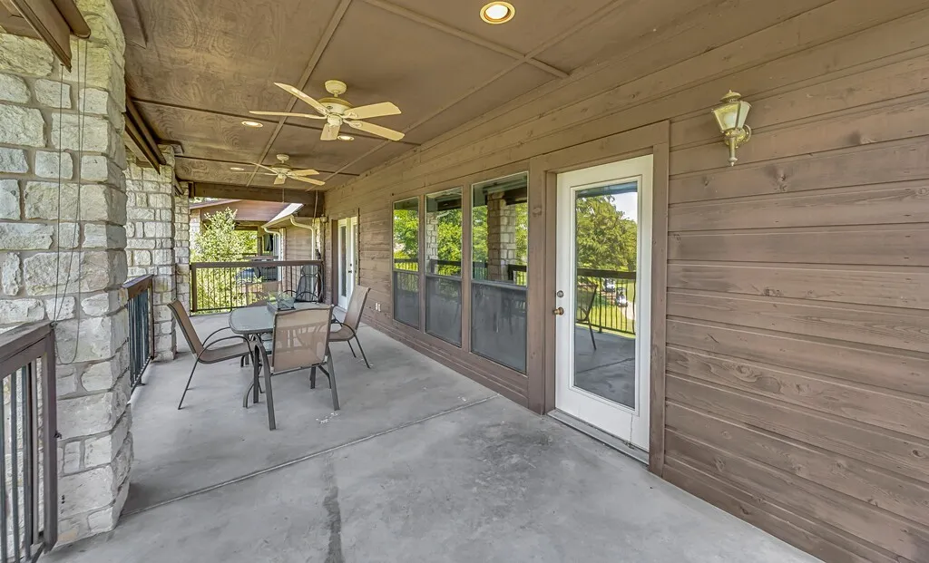 Covered large back patio with room to entertain.