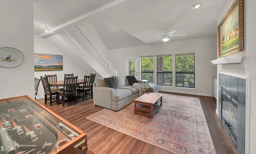 Open concept of living and dining area.  Large back windows let a lot of light in.