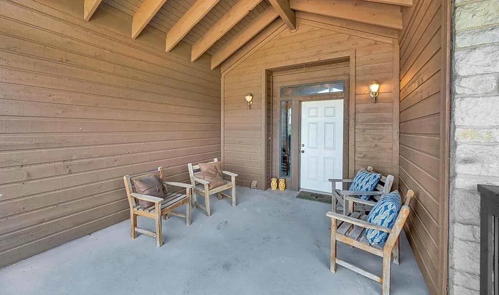 Large front porch with entry to front door.