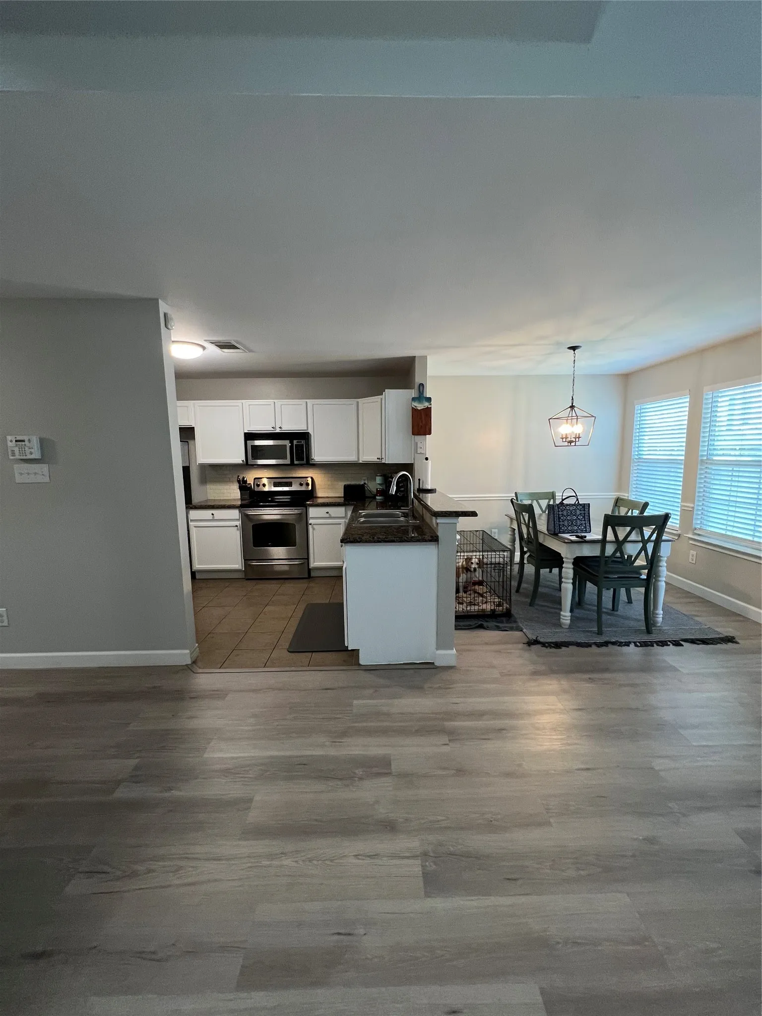 View of kitchen from living area