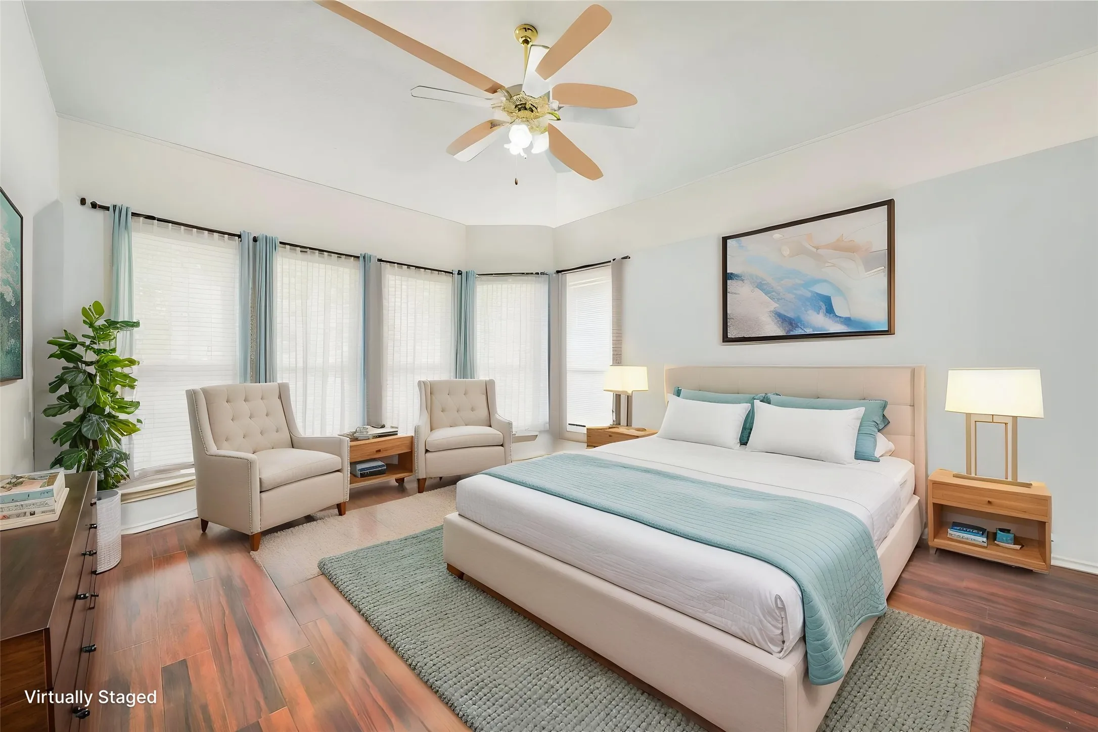 Wood-finish flooring throughout the room