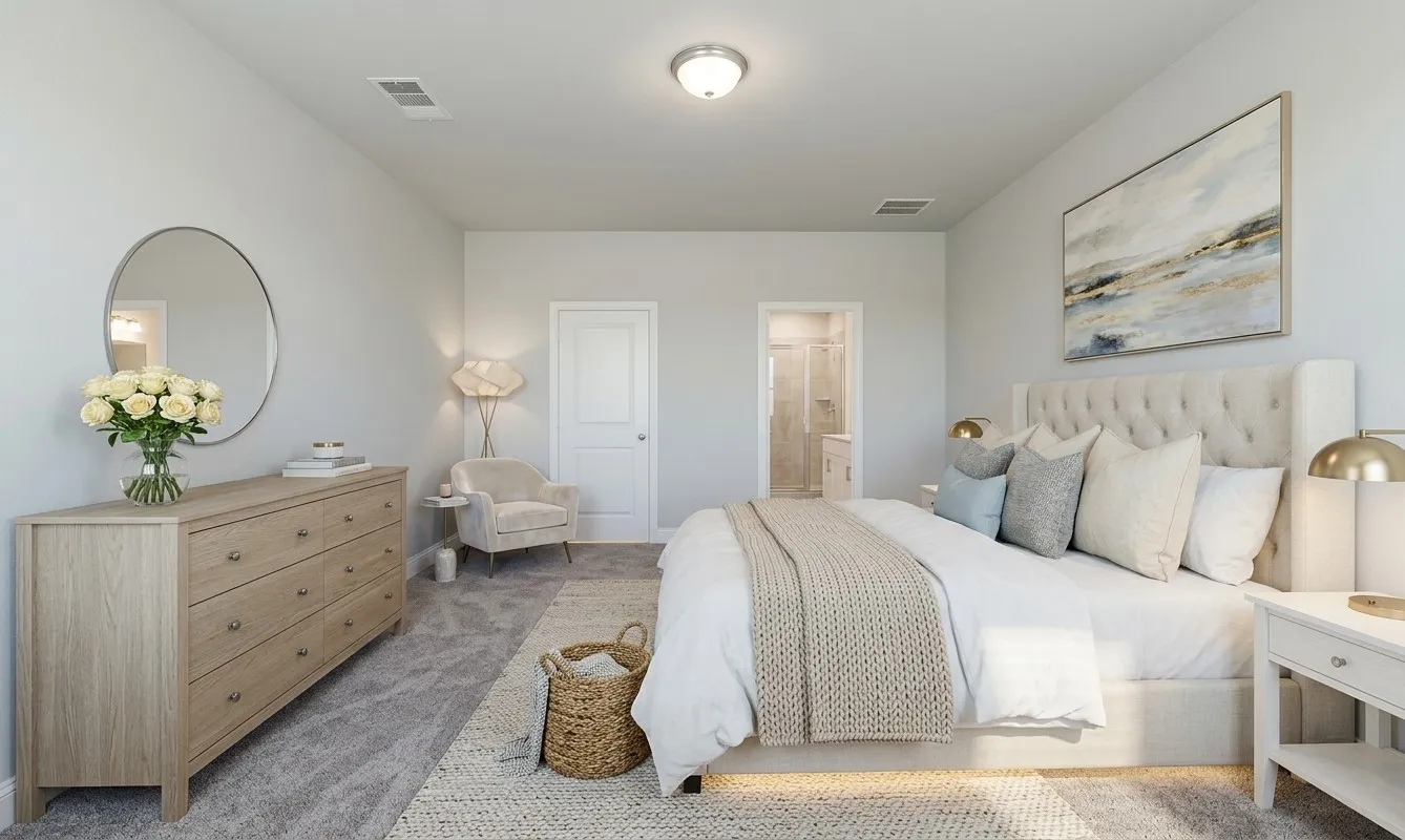 Plush carpet flooring, recessed ceiling lighting, and a neutral wall color complement the room