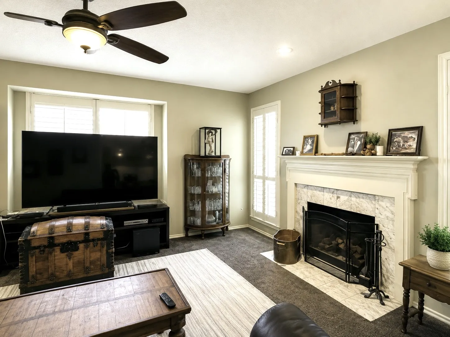 View of the woodburning fireplace in the den
