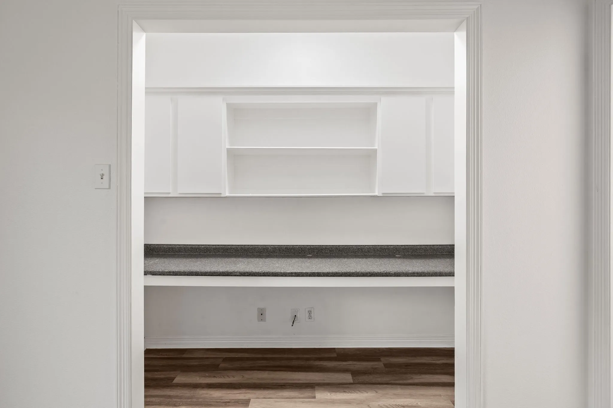 built in home office located in primary bedroom