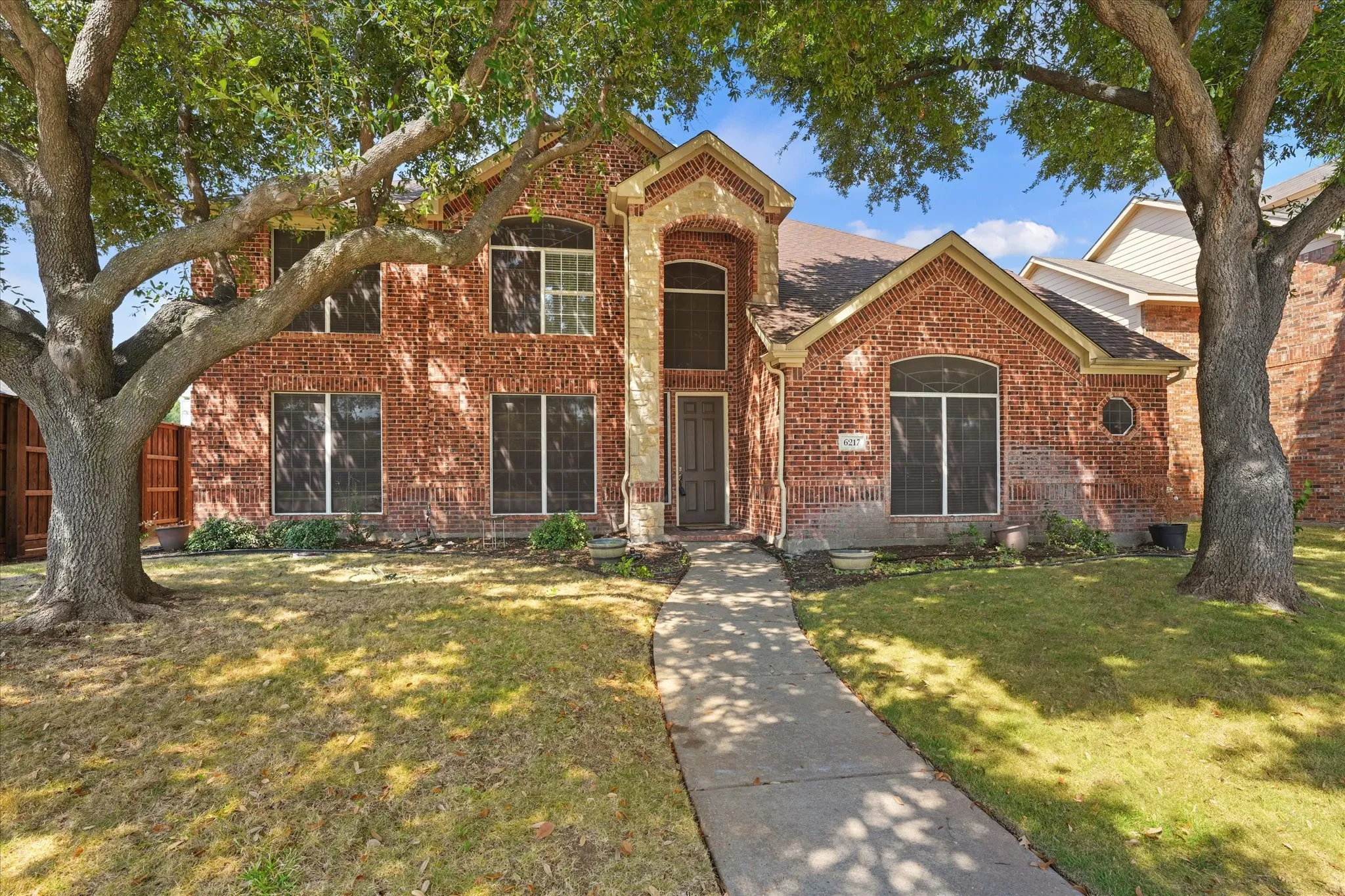 Red brick exterior with arched window details