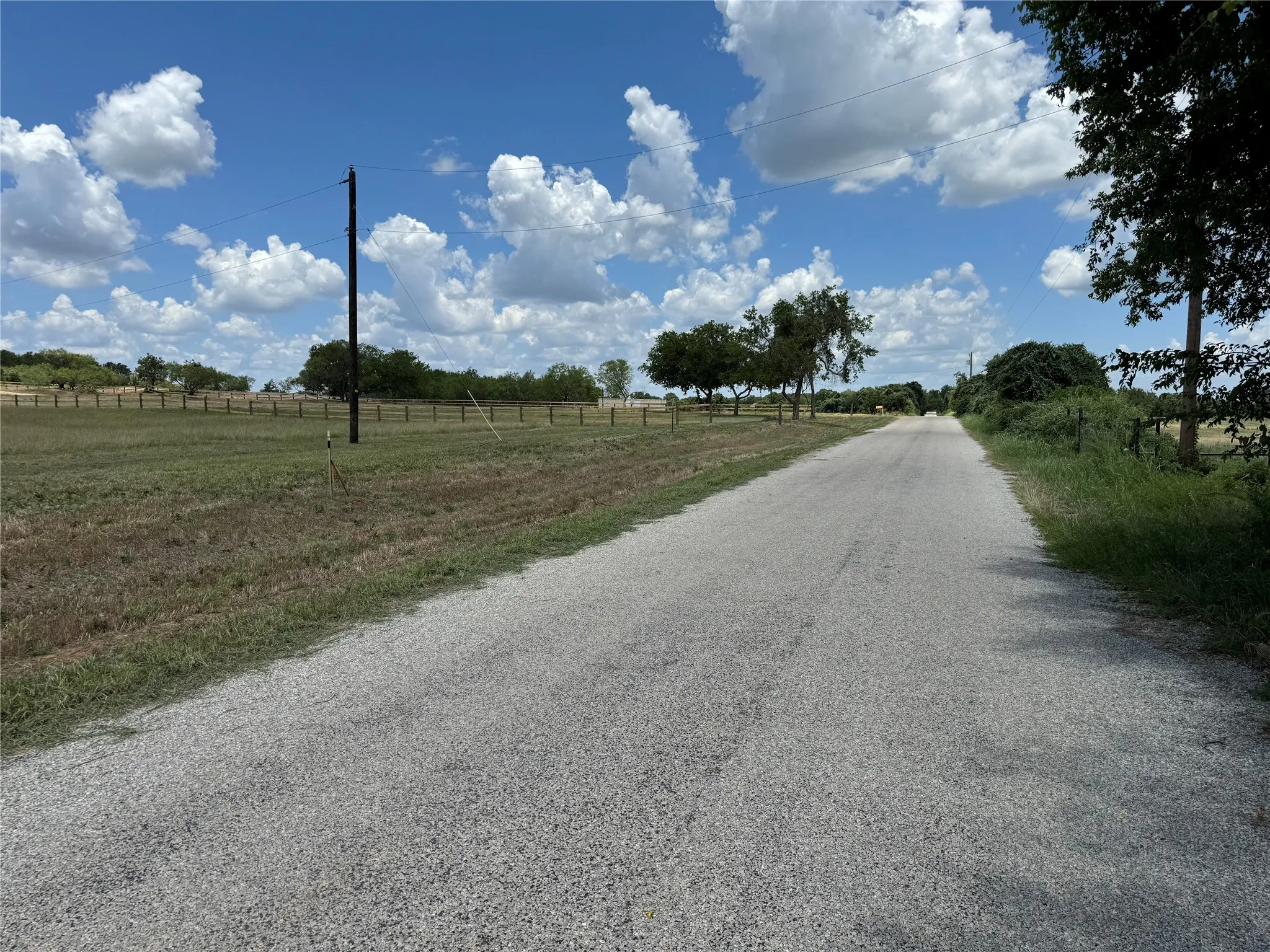 View East along CR 3735 with Lot 5 on the left starting about where the power pole is shown.