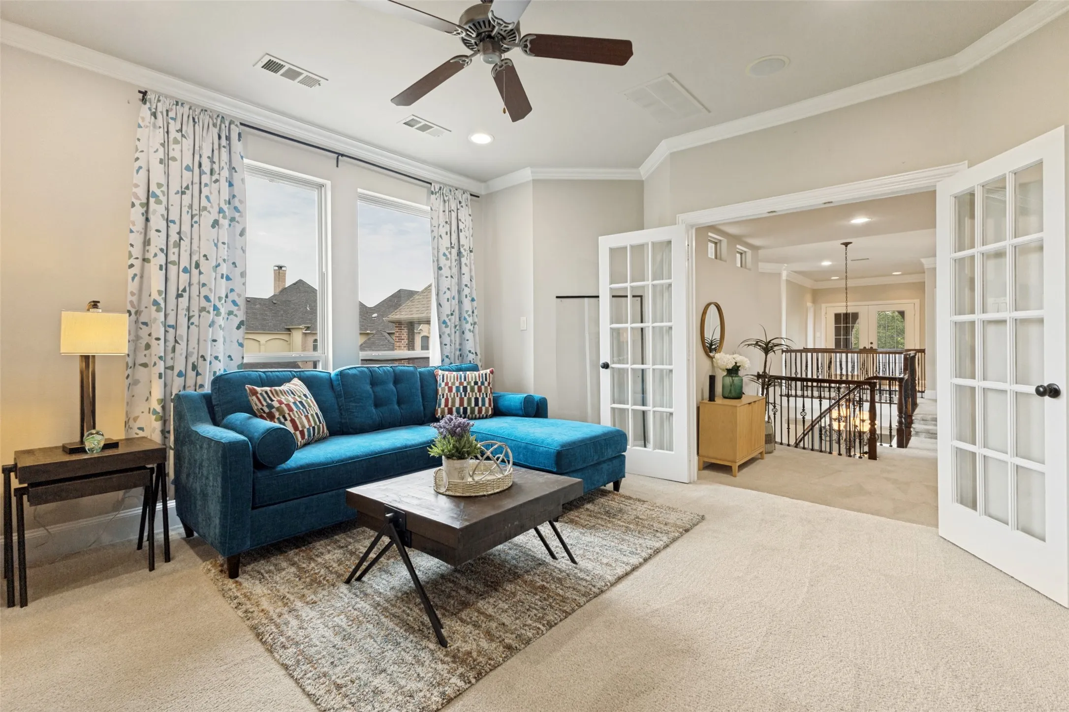 Upstairs Game Room with French Doors, which connects to the Media Room.