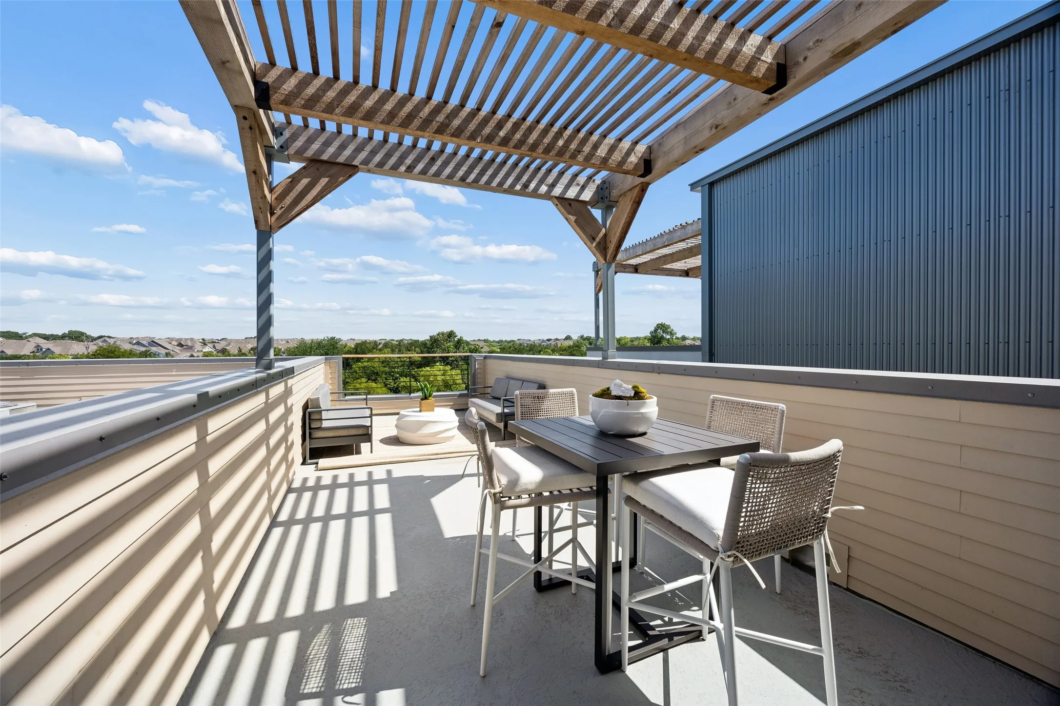 Rooftop terrace faces greenbelt.