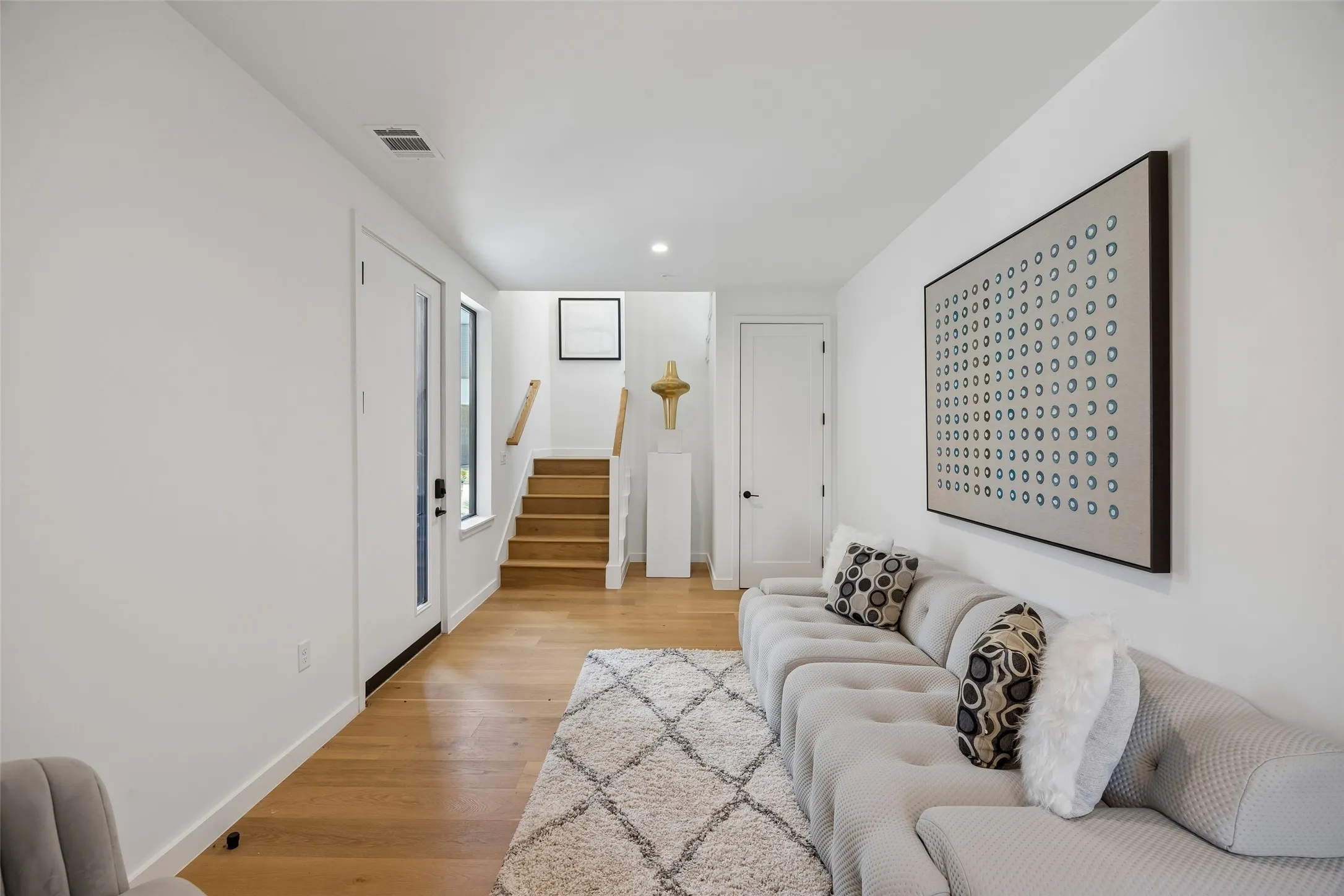 Entry living space on first floor via front door or garage.