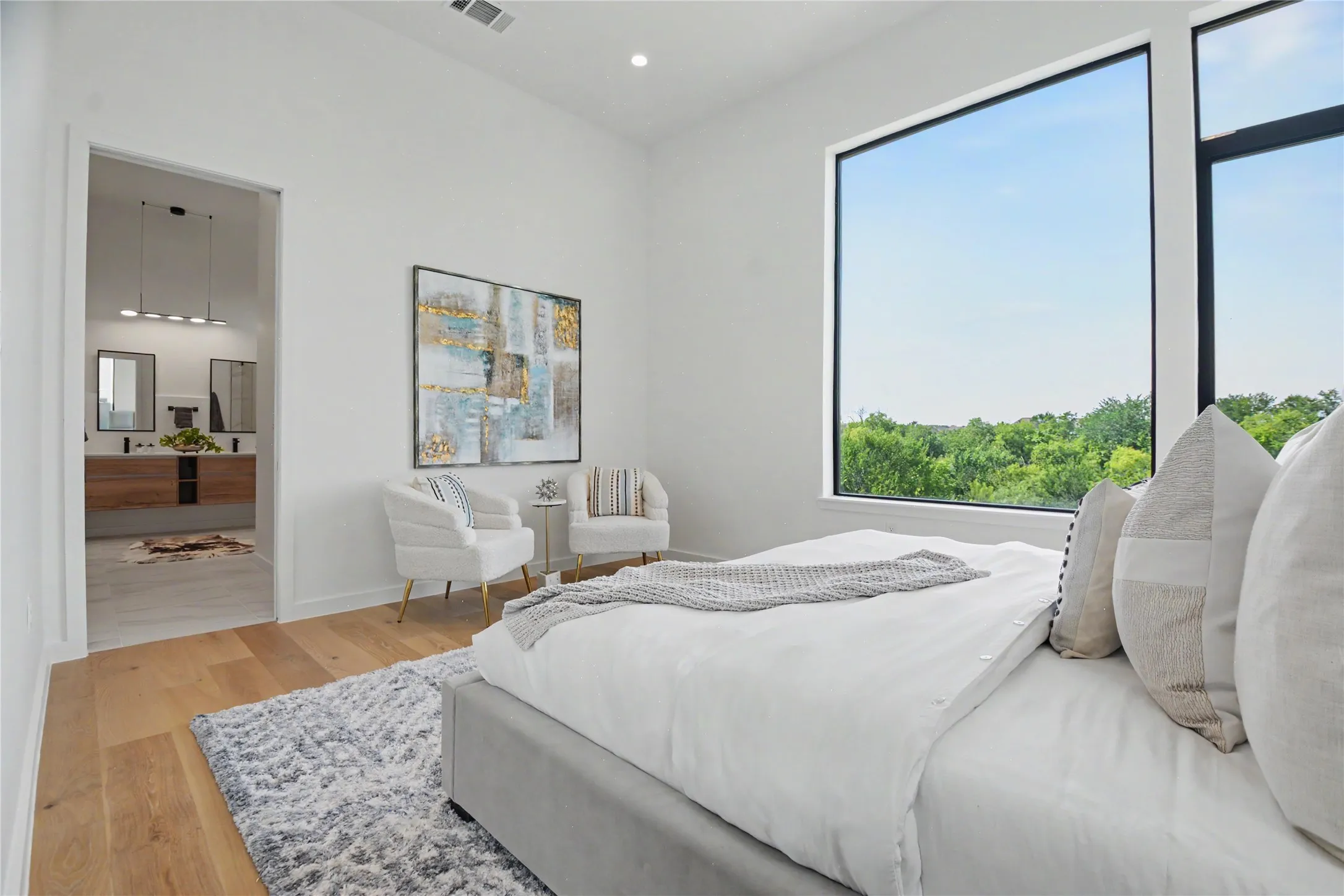 Wake up to beautiful views in your primary suite that reflects designer hotel vibes.