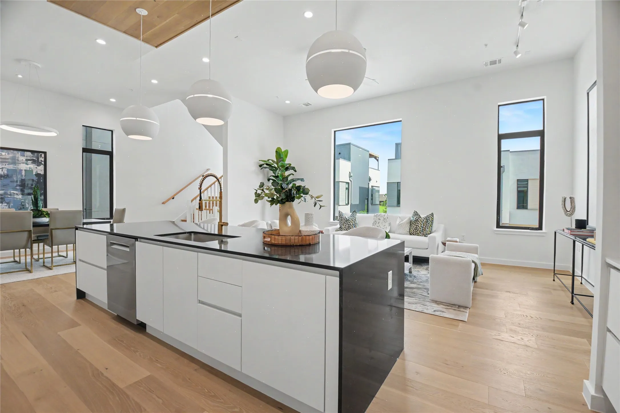 Abundant cabinets throughout, high-end appliances, soft close drawers, recycling area...