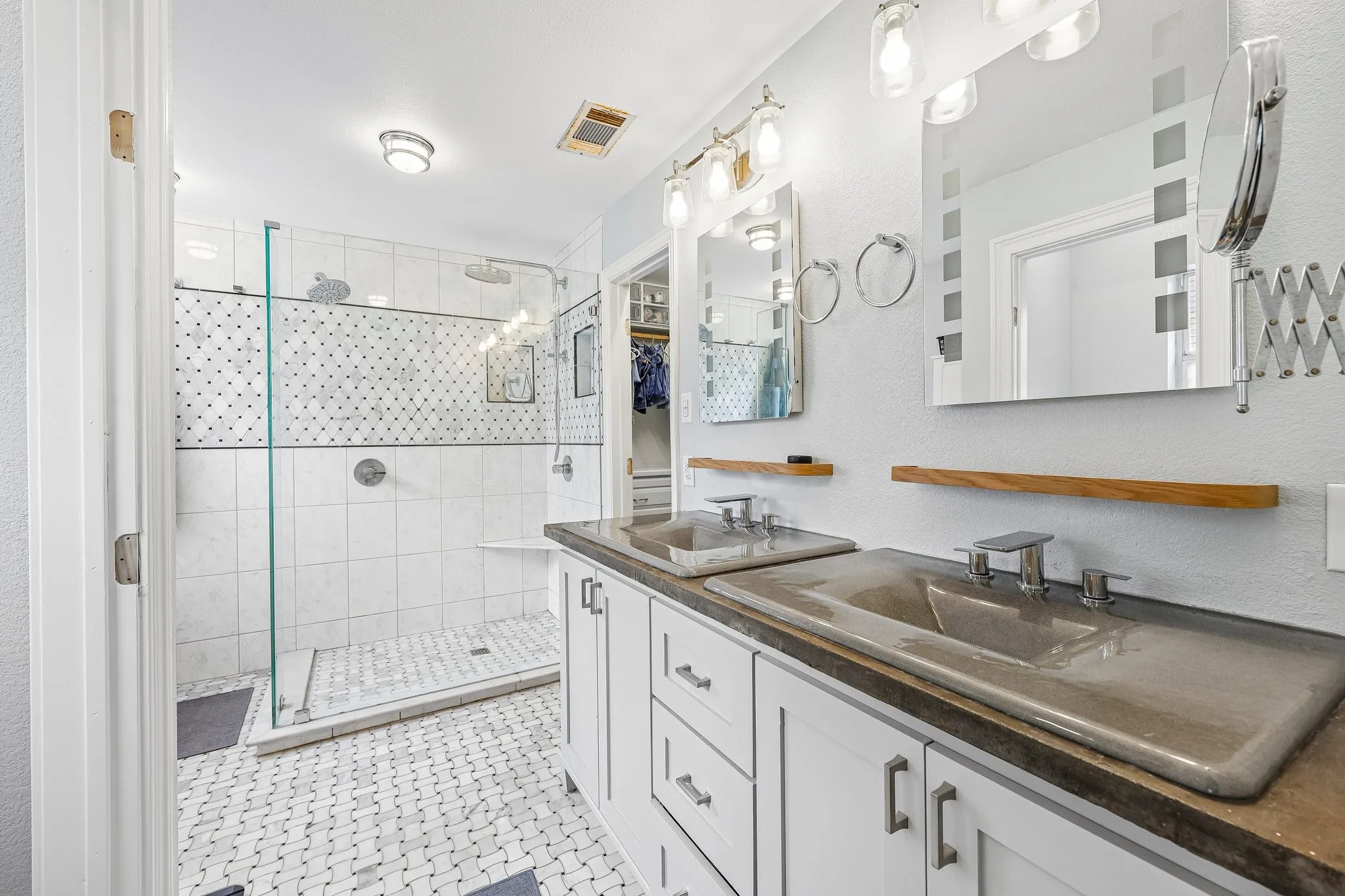 Update primary bathroom - the door to the right is the separate private room for the toilet.  Easy to have two people getting ready for the day