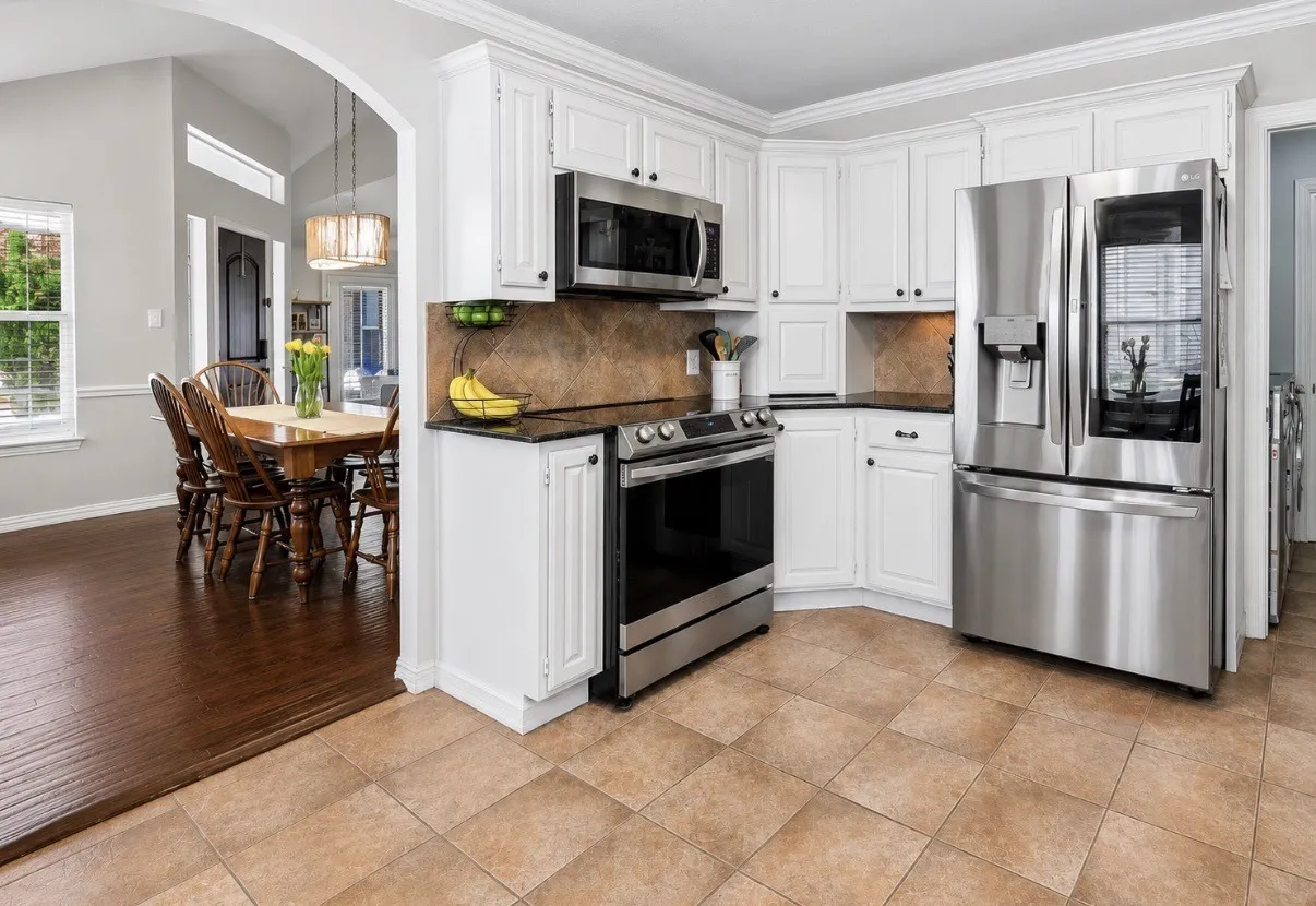 If you enjoy cooking and entertaining, you'll love how spacious this kitchen is and LOTS of cabinets