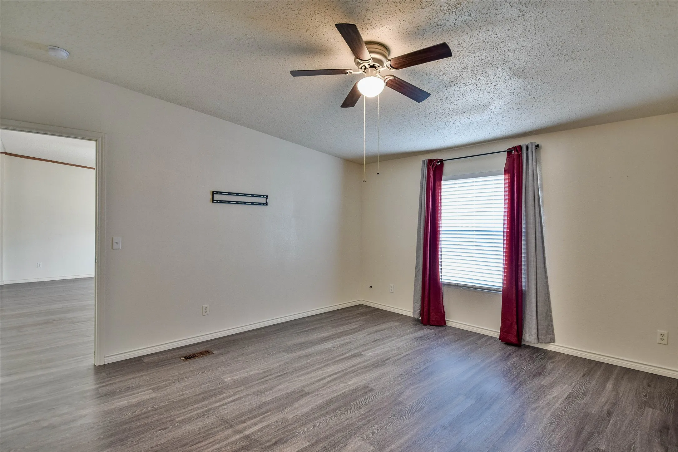 Great primary bedroom provides ample space for your furniture!