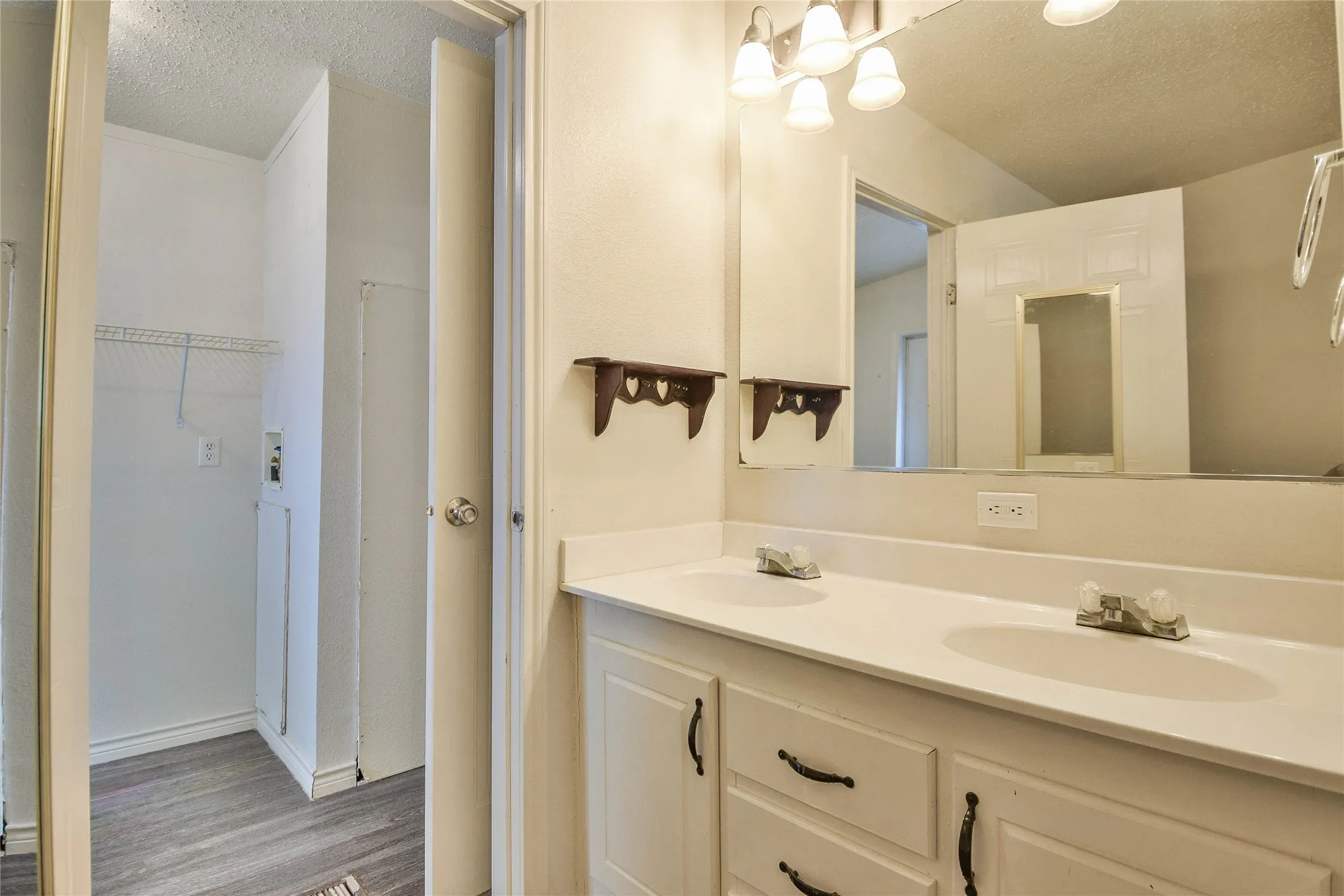 Great ensuite bathroom looking into the walk-in closet.