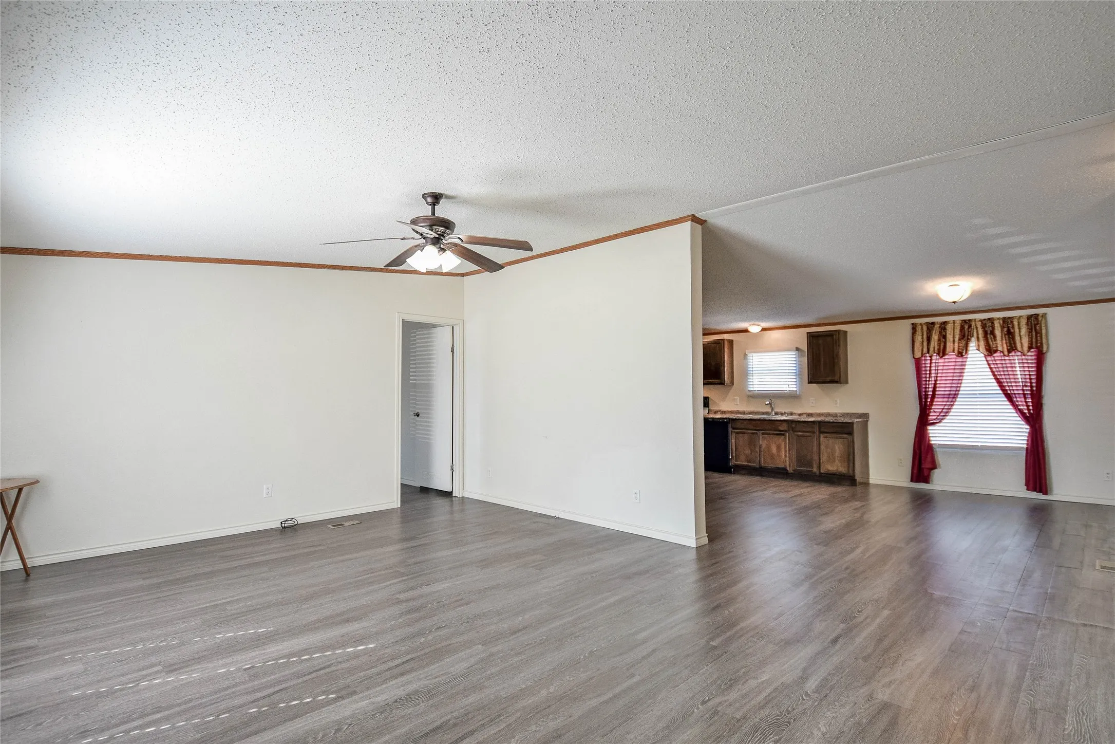 Living area into the dining room and kitchen.