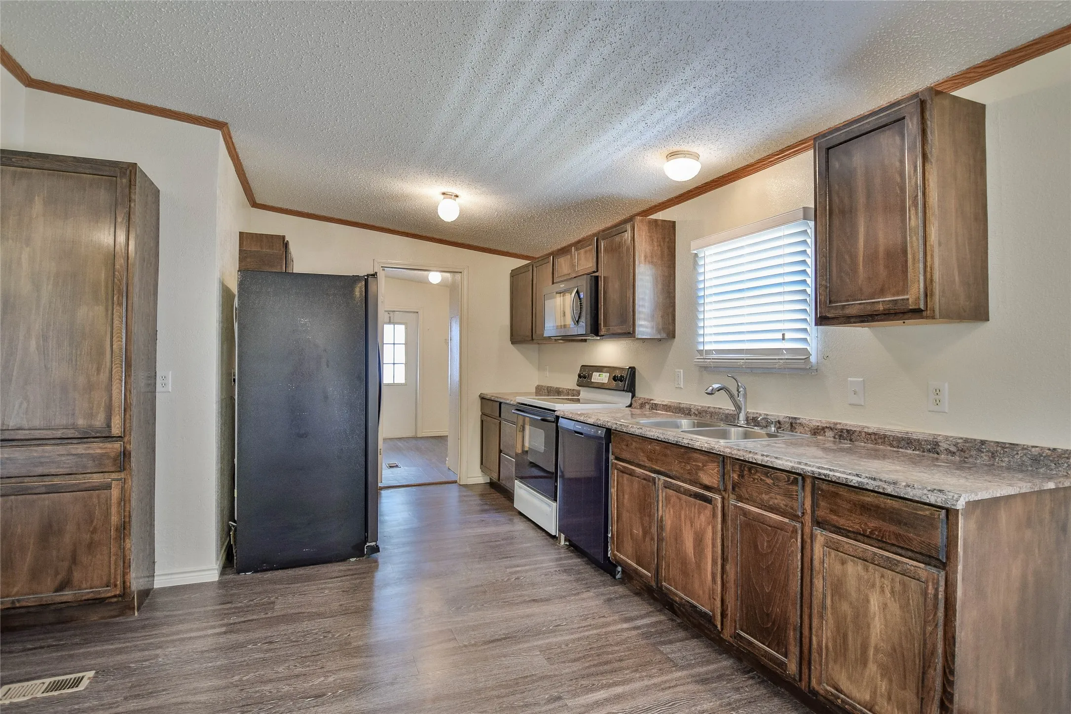 Refrigerator stays with home with acceptable offer.