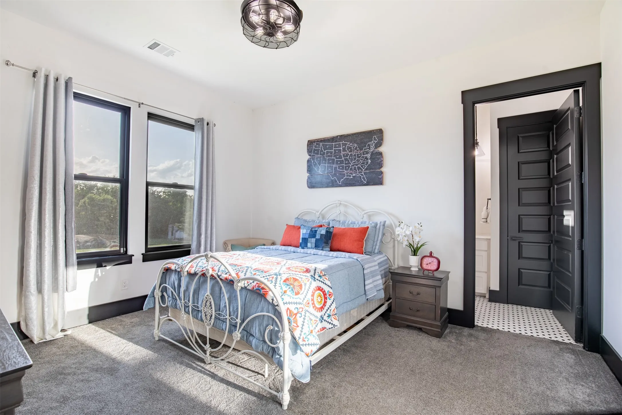 Downstairs guest suite includes ensuite bath and is separated from owner's retreat