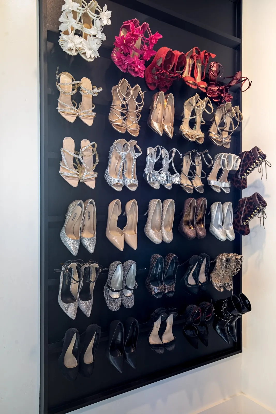 Charming shoe holder in primary closet perfect for quick access and display