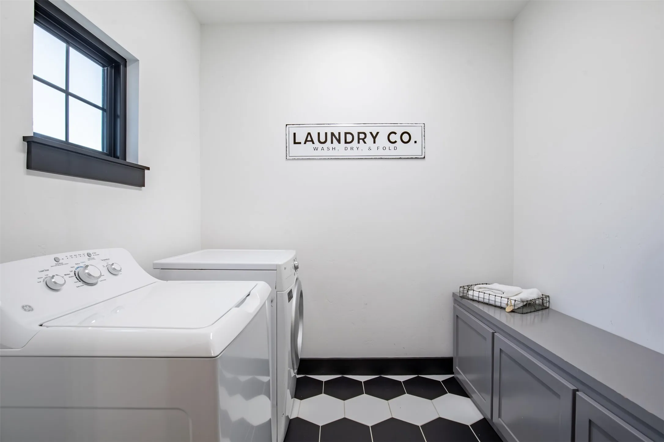 Dedicated upstairs laundry room to service the upstairs bedrooms with built-in storage