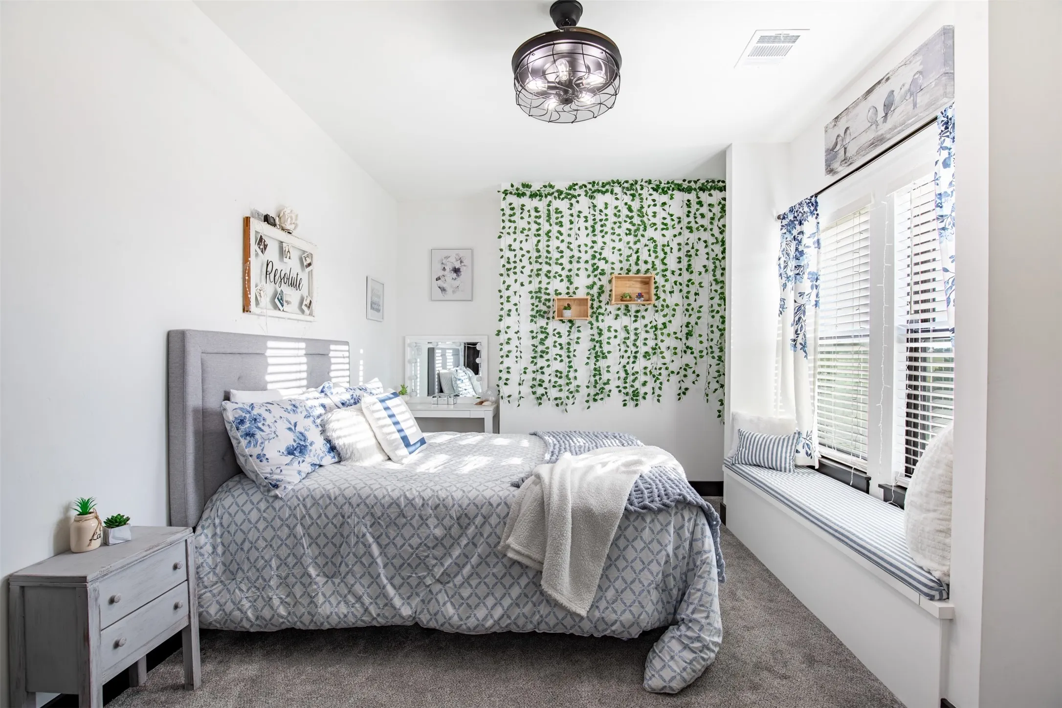 Upstairs secondary bedroom with lovely view of the backyard and JnJ bathroom.